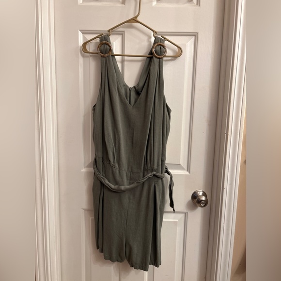 Adorne Woman Pants - Adorne Woman Nia v-neck pleated olive green romper shorts with pockets.
